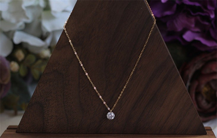 Single zircon and diamond necklace