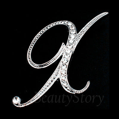 English letter brooch with diamonds