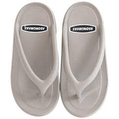 A Pair Of Sandals And Slippers For Couples In Domestic Dormitory