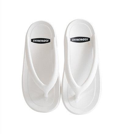 A Pair Of Sandals And Slippers For Couples In Domestic Dormitory