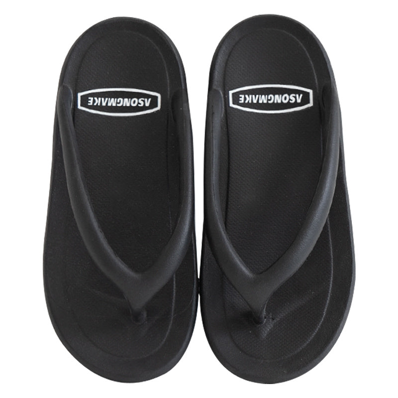 A Pair Of Sandals And Slippers For Couples In Domestic Dormitory