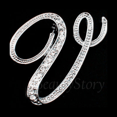 English letter brooch with diamonds