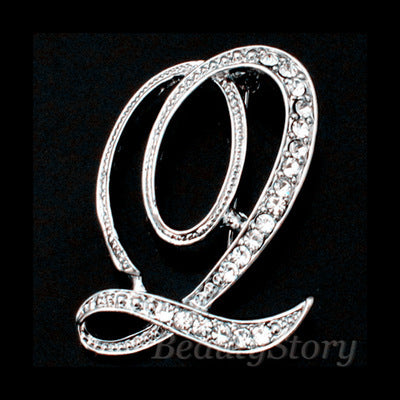 English letter brooch with diamonds