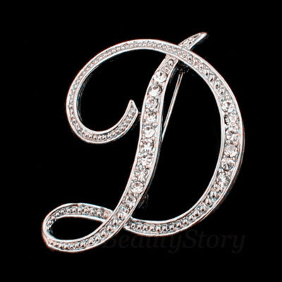 English letter brooch with diamonds