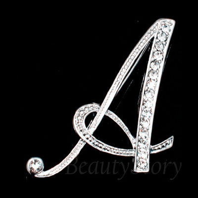 English letter brooch with diamonds