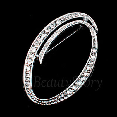 English letter brooch with diamonds