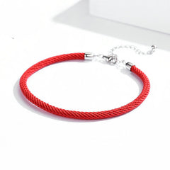 Red braided bracelet