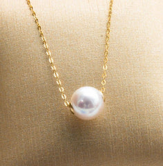 Road pass 18 K gold Akoya natural seawater pearl pendant necklace, clavicle containing 18K gold chain factory direct sales