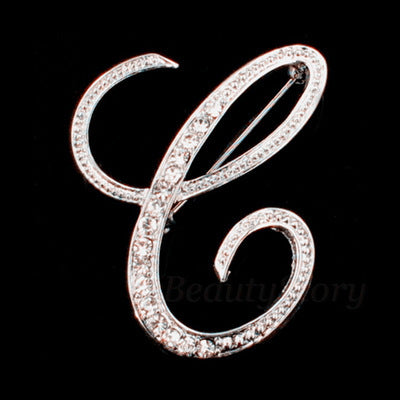 English letter brooch with diamonds