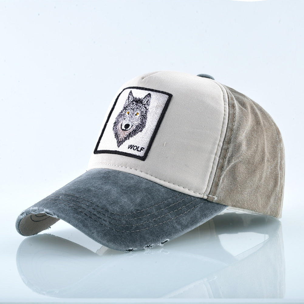 Black cotton baseball cap with wolf design - close-up