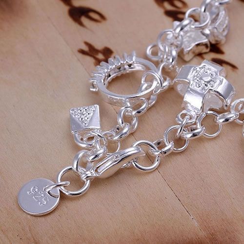 "Elegant silver-plated charm bracelet for women"