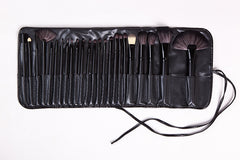 Full 24-piece makeup brush set laid out